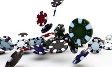 Player's hand holding phone in portrait mode showing AduQ live baccarat table mid-round